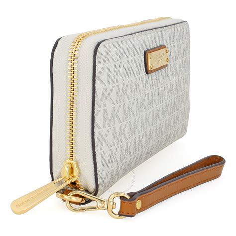 michael kors jet set travel leather cosmetic pouch|Michael Kors vanilla jet set.